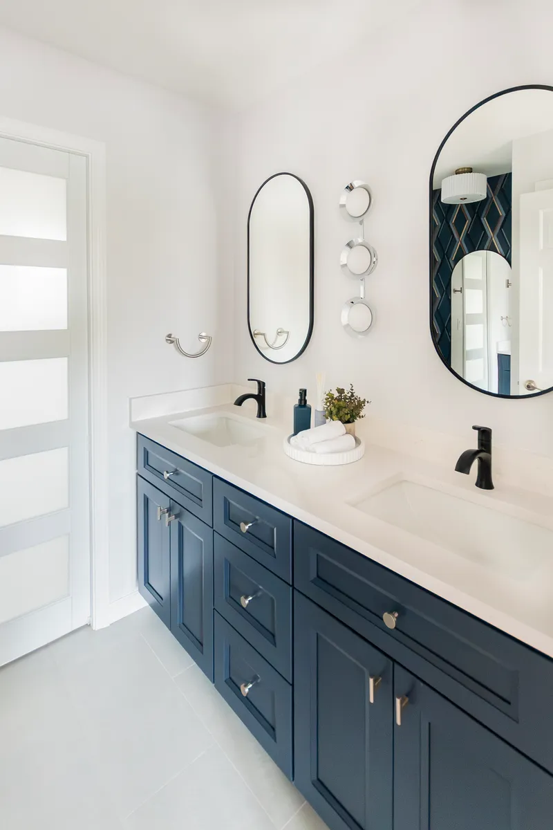 Bathroom renovation - navy vanity with dual mirrors